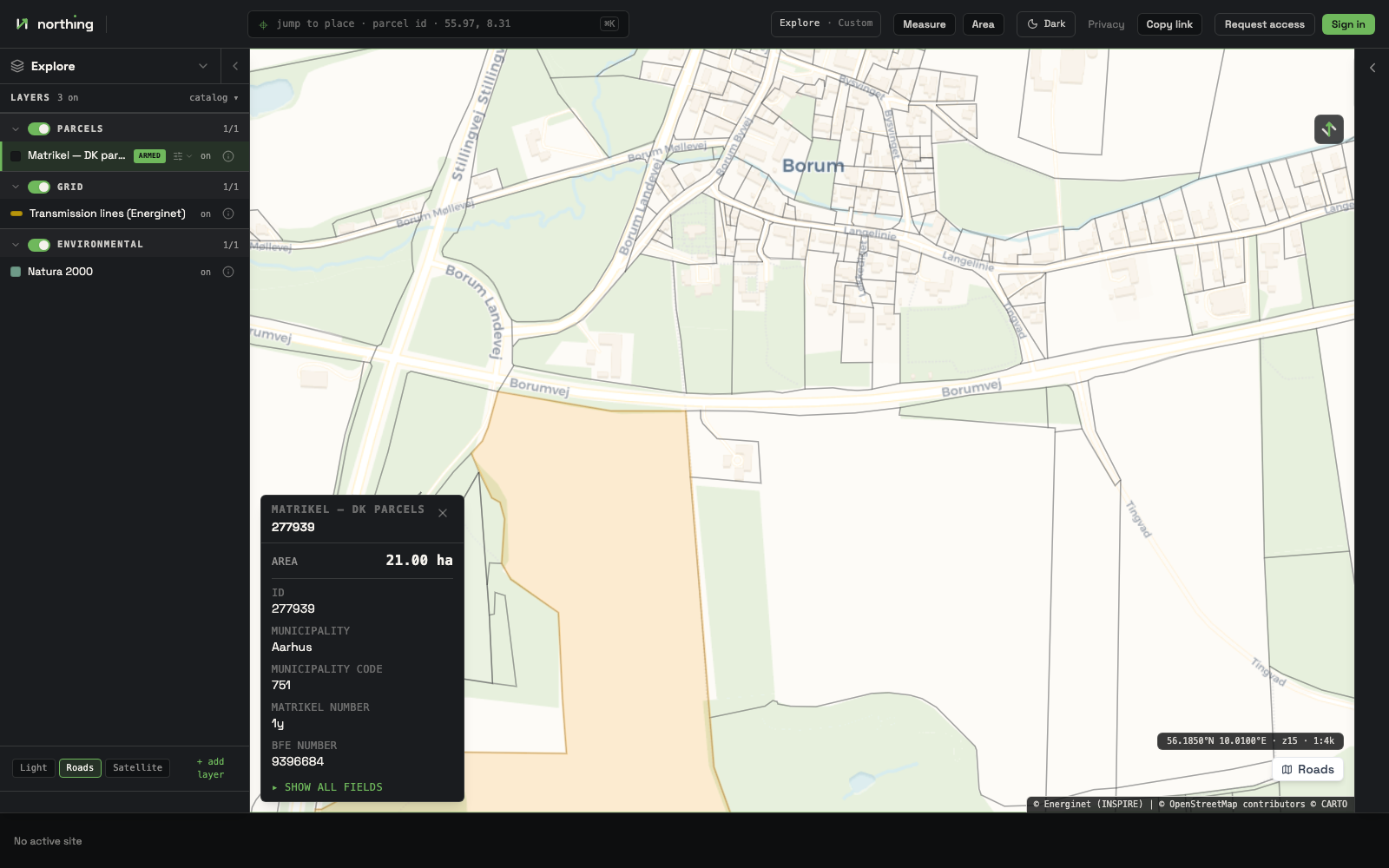 Northing console: Danish cadastral parcels, grid and Natura 2000 layers over a village, with a selected 21 ha parcel's details in the inspector